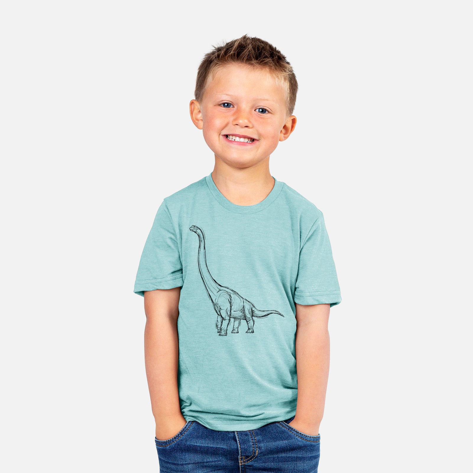 Two youth t-shirts in different colors on hangers, printed with a black ink illustration of a long-necked Apatosaurus walking.