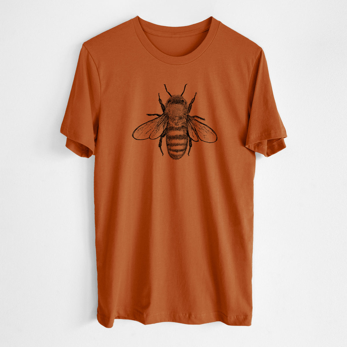 Autumn lightweight cotton t-shirt laid flat, printed with a detailed black ink illustration of a honey bee with its wings spread, seen from above.