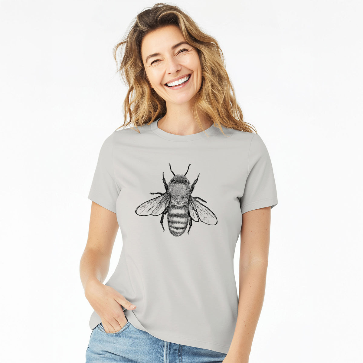 Woman wearing a lunar grey women's relaxed fit cotton t-shirt printed with a detailed black ink illustration of a honey bee with its wings spread, seen from above.