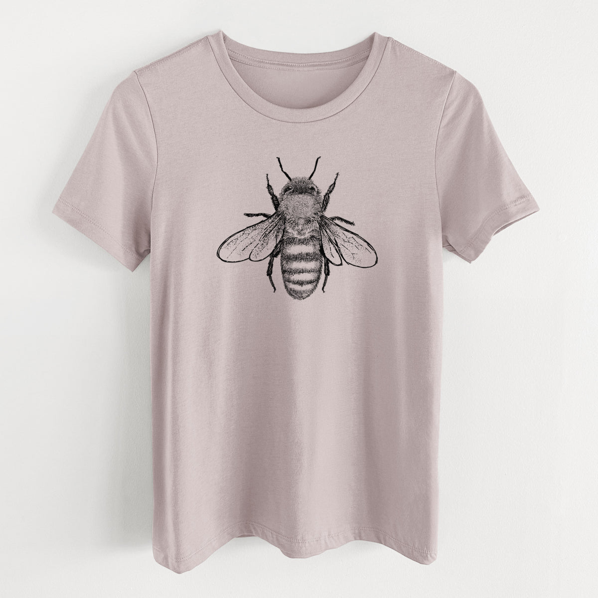 Pink gravel women's relaxed fit cotton t-shirt laid flat, printed with a detailed black ink illustration of a honey bee with its wings spread, seen from above.