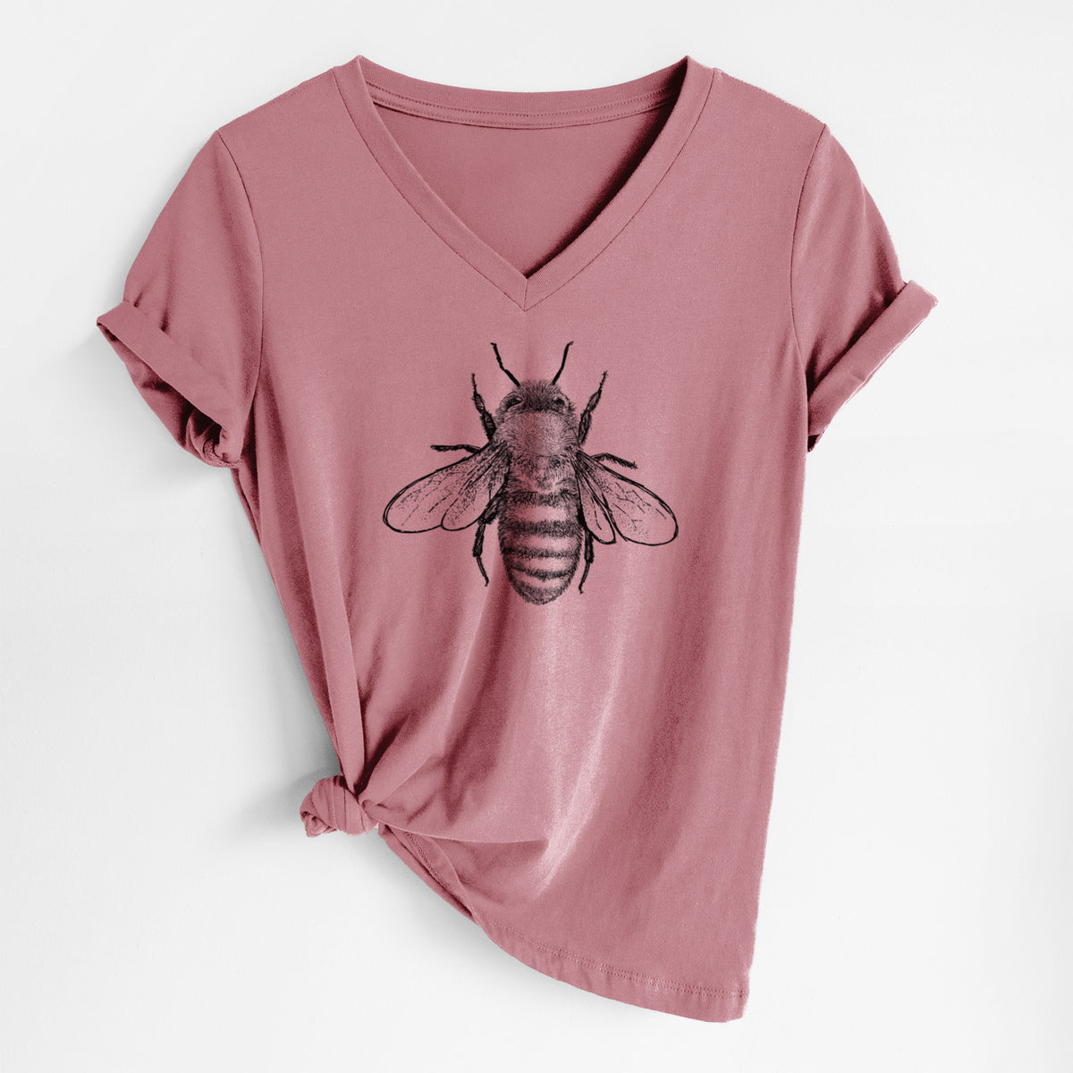 Mauve pink women's relaxed fit cotton V-neck t-shirt laid flat, printed with a detailed black ink illustration of a honey bee with its wings spread, seen from above.