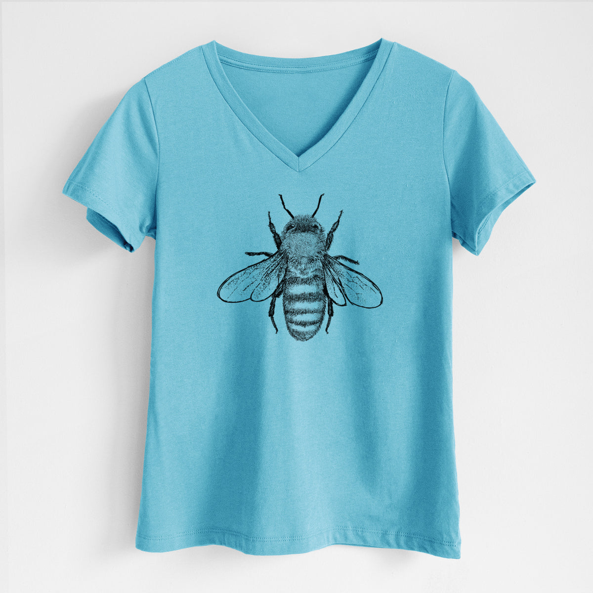 Turquoise women's relaxed fit cotton V-neck t-shirt laid flat, printed with a detailed black ink illustration of a honey bee with its wings spread, seen from above.