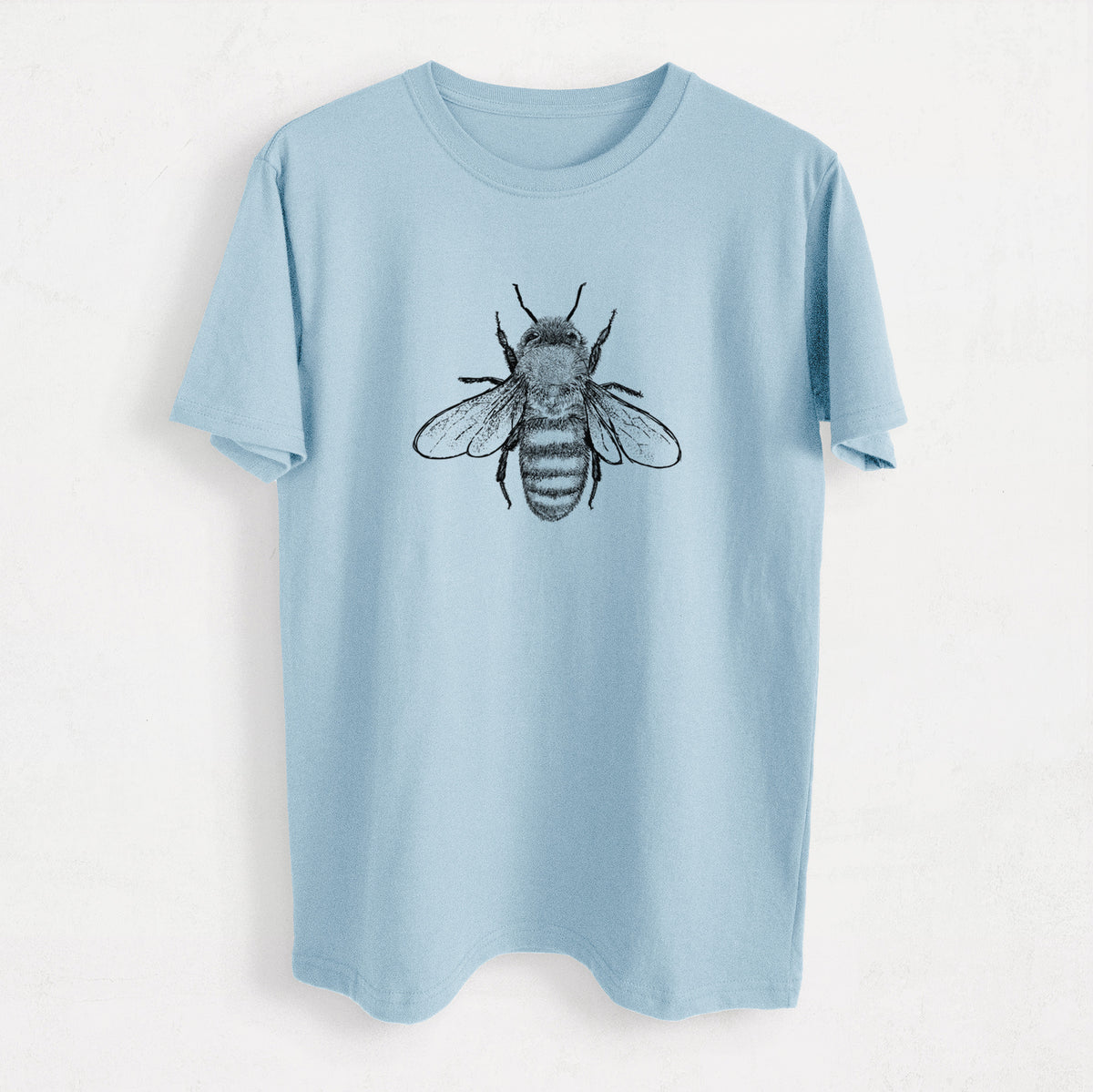 Ice blue organic cotton t-shirt printed with a detailed black ink illustration of a honey bee with its wings spread, seen from above.