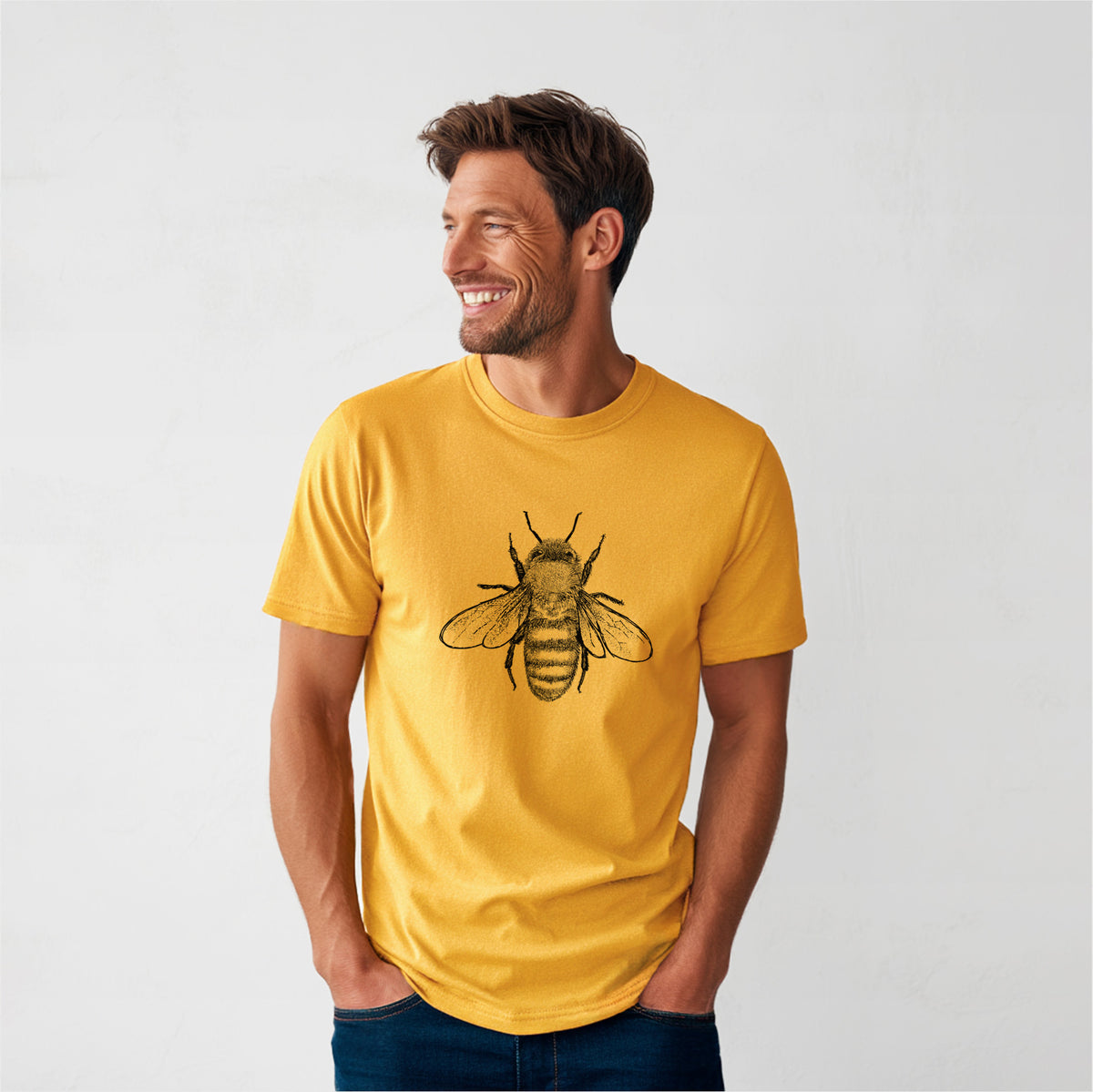Male model organic cotton t-shirt printed with a detailed black ink illustration of a honey bee with its wings spread, seen from above.