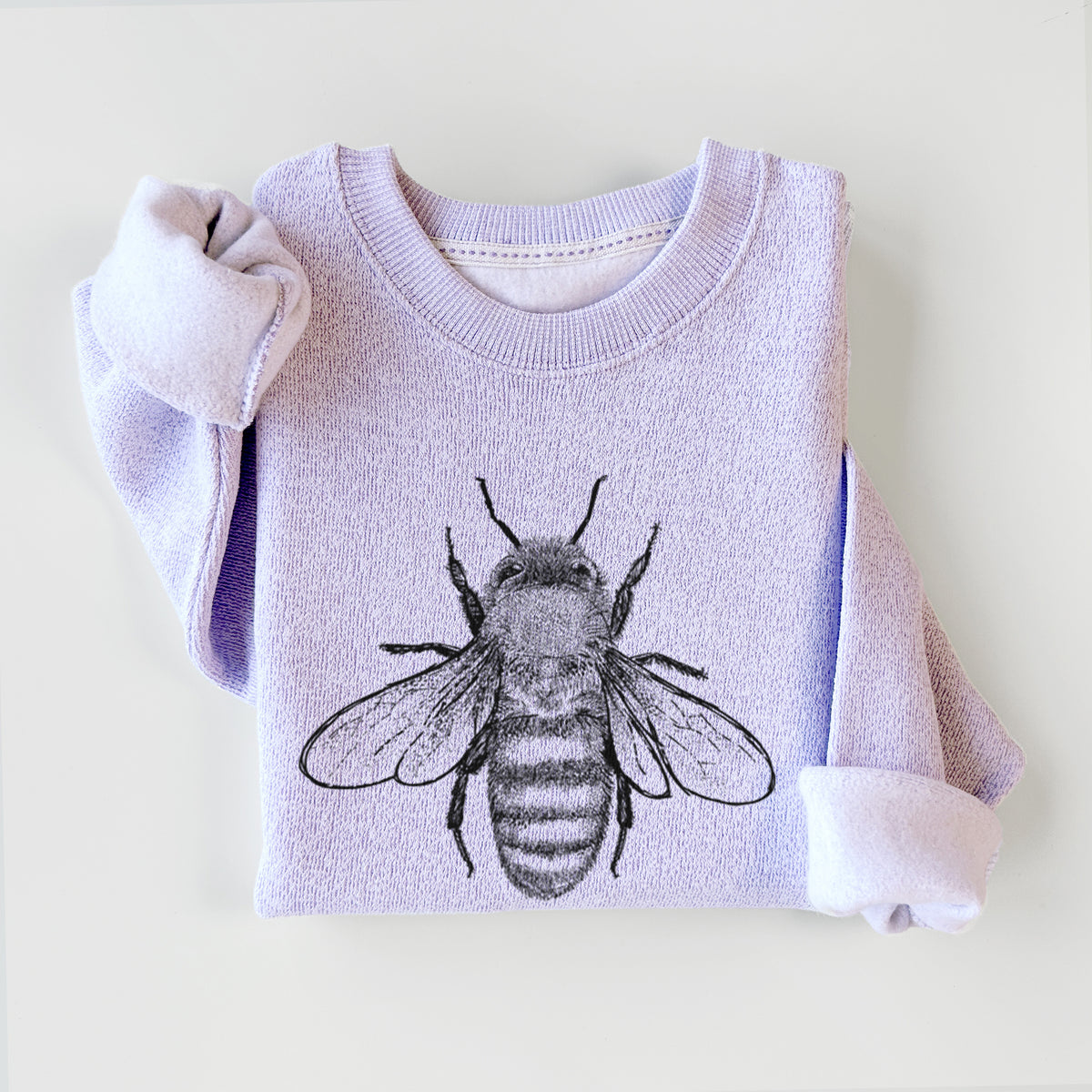 Ice purple knit sweatshirt printed with a detailed black ink illustration of a honey bee with its wings spread, seen from above, styled flat.