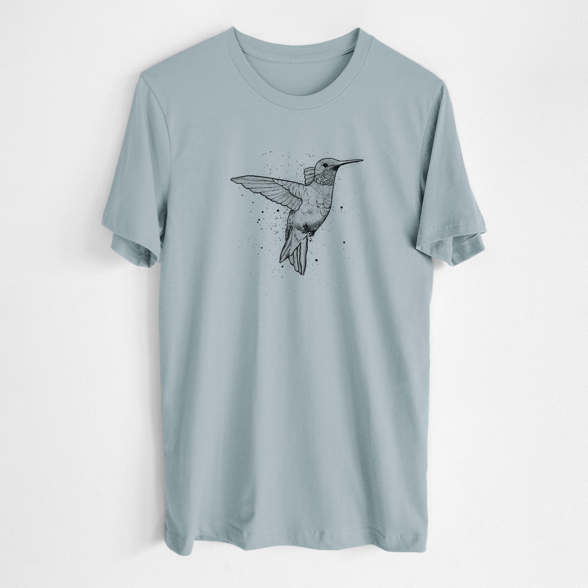 Vintage denim lightweight cotton t-shirt laid flat, printed with a black ink sketch of a ruby-throated hummingbird hovering with its wings raised.