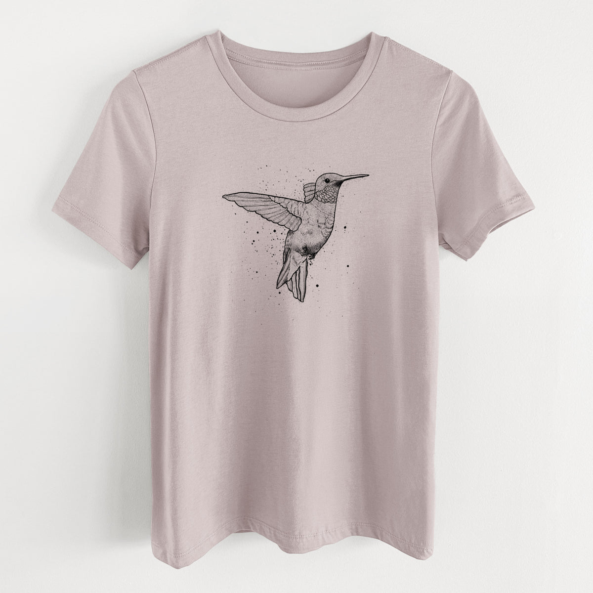 Pink gravel women's relaxed fit cotton t-shirt laid flat, printed with a black ink sketch of a ruby-throated hummingbird hovering with its wings raised.