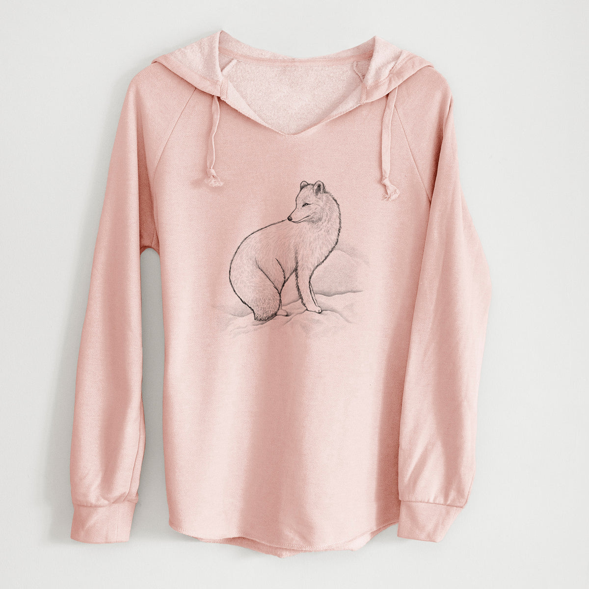Blush pink women's Cali Wave hooded sweatshirt laid flat, printed with a black ink illustration of an arctic fox sitting in the snow.