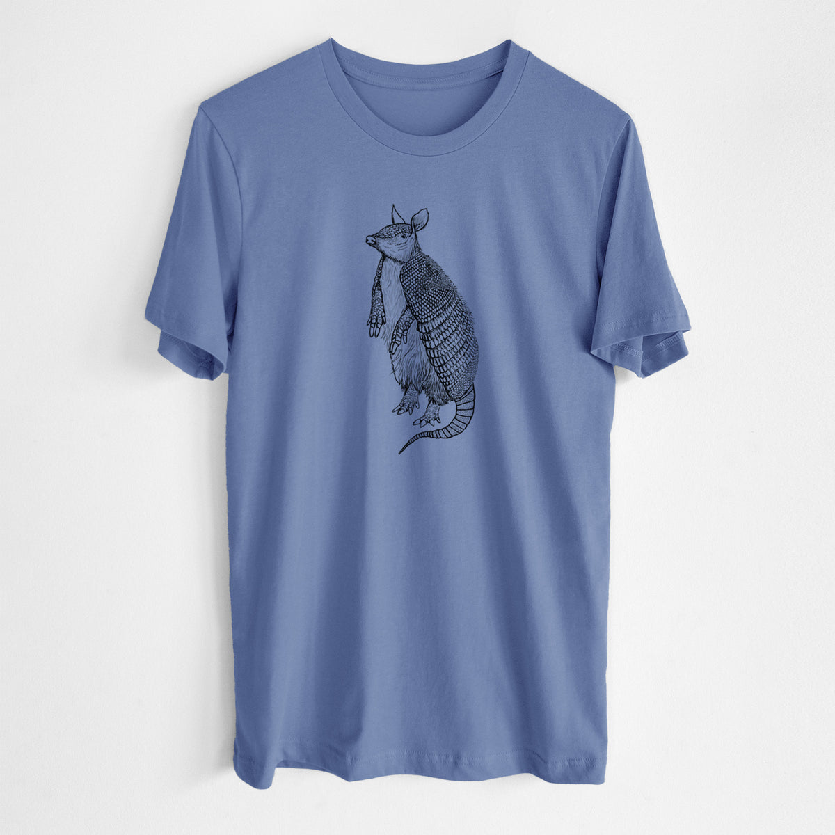 Blue bell lightweight cotton t-shirt laid flat, printed with a black ink illustration of a nine-banded armadillo standing upright.