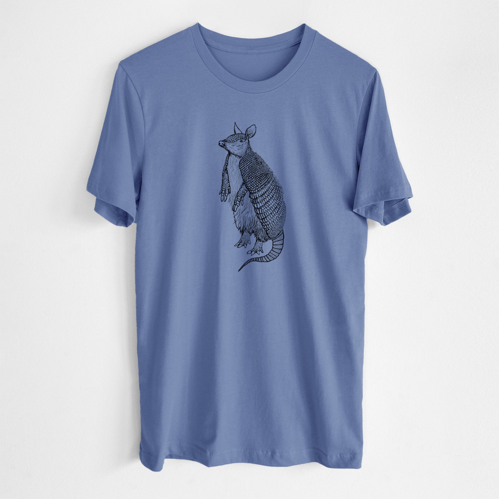 Blue bell lightweight cotton t-shirt laid flat, printed with a black ink illustration of a nine-banded armadillo standing upright.