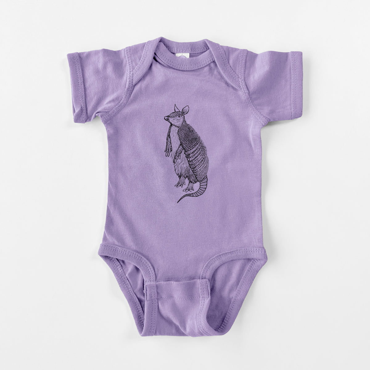 Lavender baby bodysuit laid flat, printed with a black ink illustration of a nine-banded armadillo standing upright.