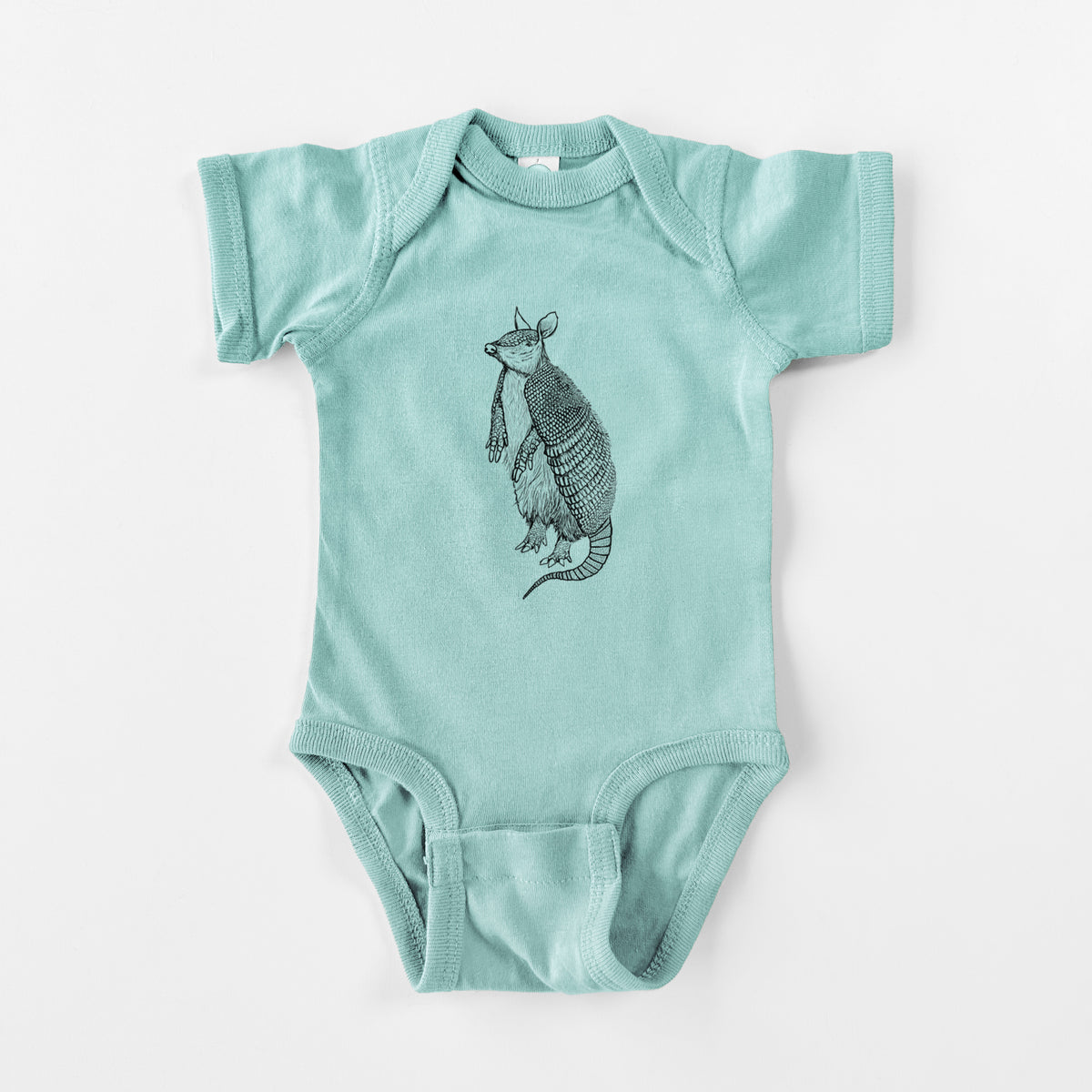 Saltwater baby bodysuit laid flat, printed with a black ink illustration of a nine-banded armadillo standing upright.