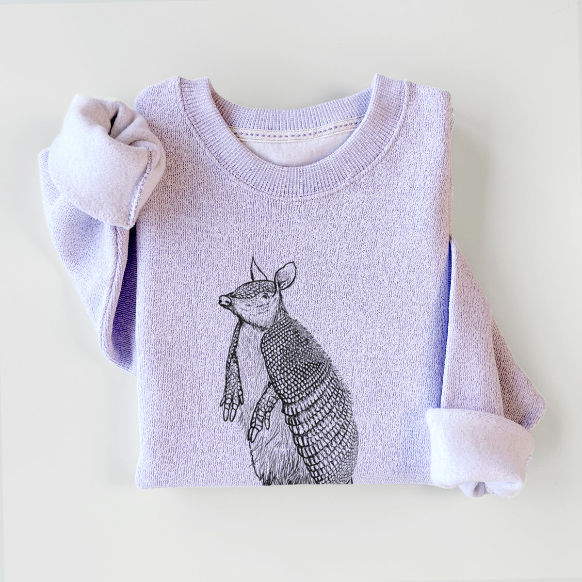 Ice purple knit sweatshirt printed with a black ink illustration of a nine-banded armadillo standing upright, styled flat.