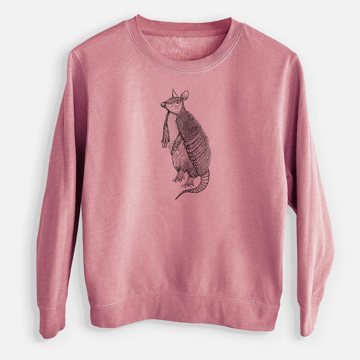Mauve pink youth crewneck sweatshirt laid flat, printed with a black ink illustration of a nine-banded armadillo standing upright.