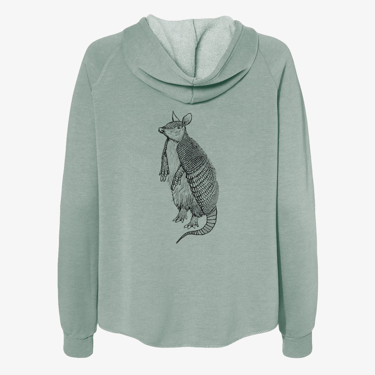 Sage green women's Cali Wave zip-up sweatshirt laid flat, printed with a black ink illustration of a nine-banded armadillo standing upright.