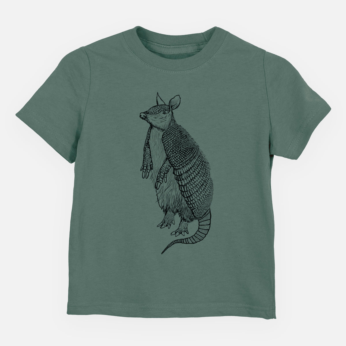 Basil green toddler t-shirt laid flat, printed with a black ink illustration of a nine-banded armadillo standing upright.