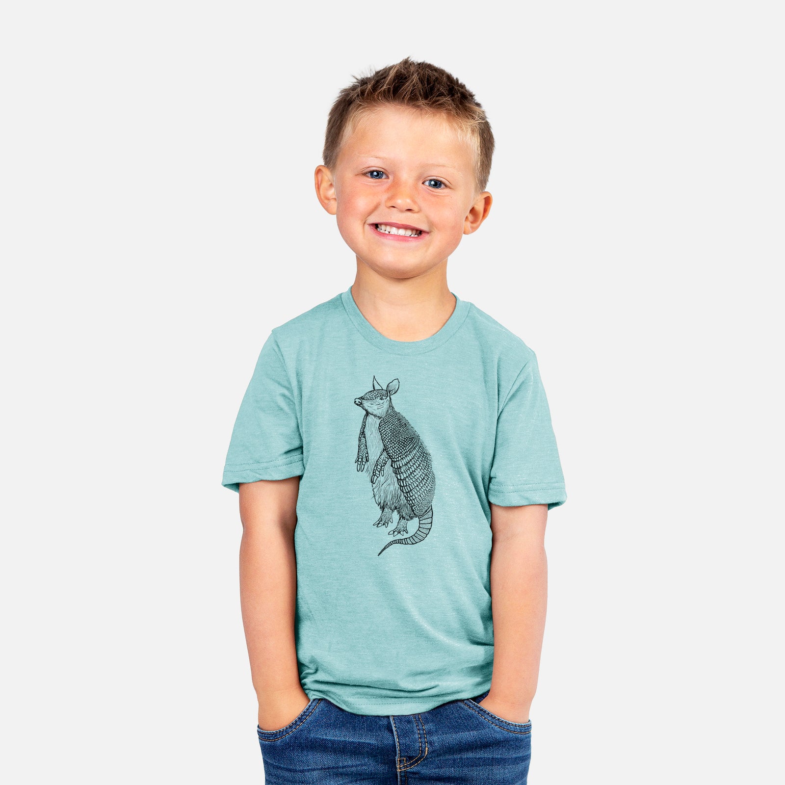 Two youth t-shirts in different colors on hangers, printed with a black ink illustration of a nine-banded armadillo standing upright.