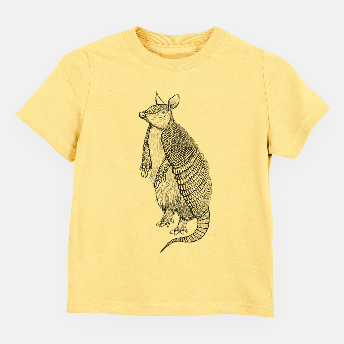 Butter yellow toddler t-shirt laid flat, printed with a black ink illustration of a nine-banded armadillo standing upright.