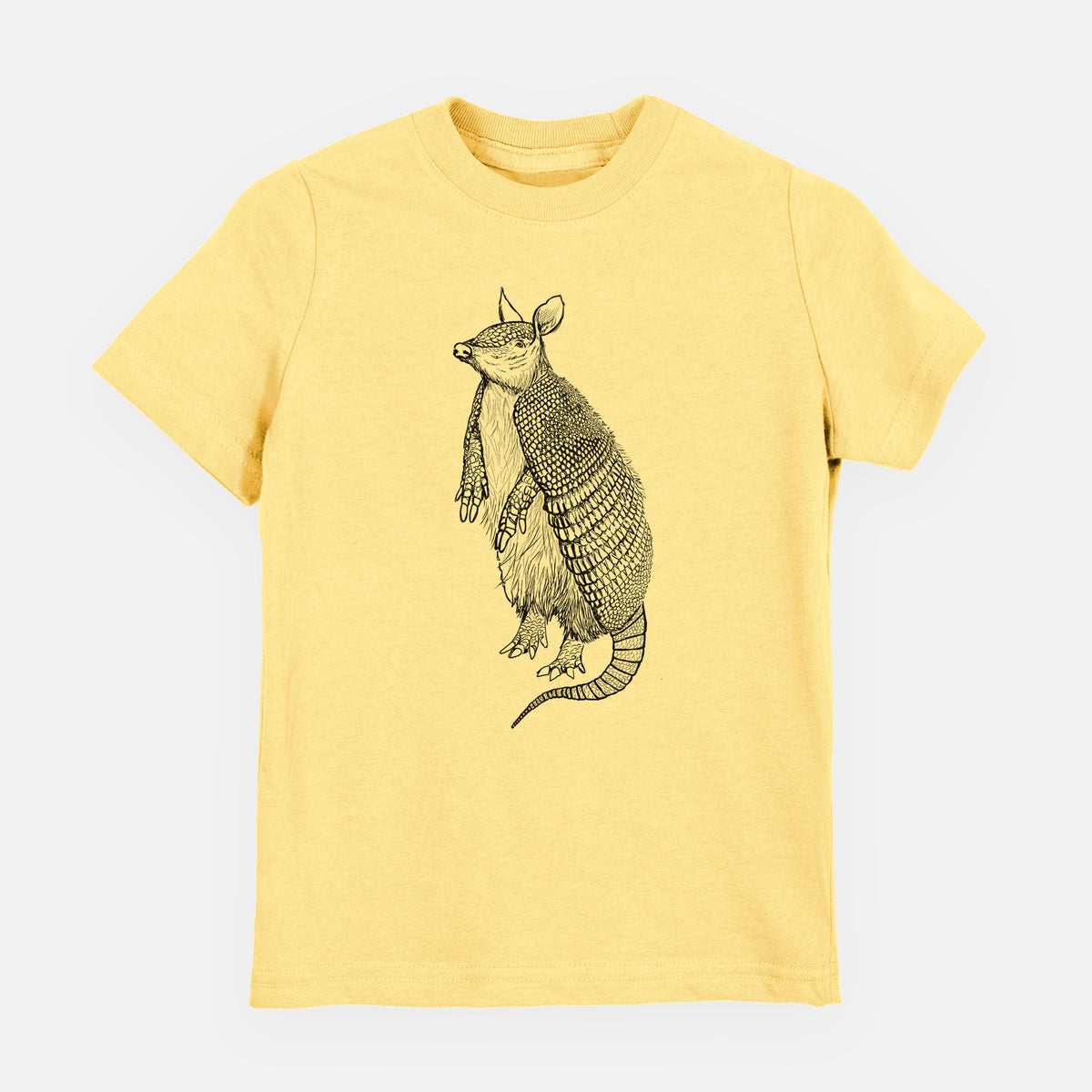 Butter yellow youth t-shirt laid flat, printed with a black ink illustration of a nine-banded armadillo standing upright.
