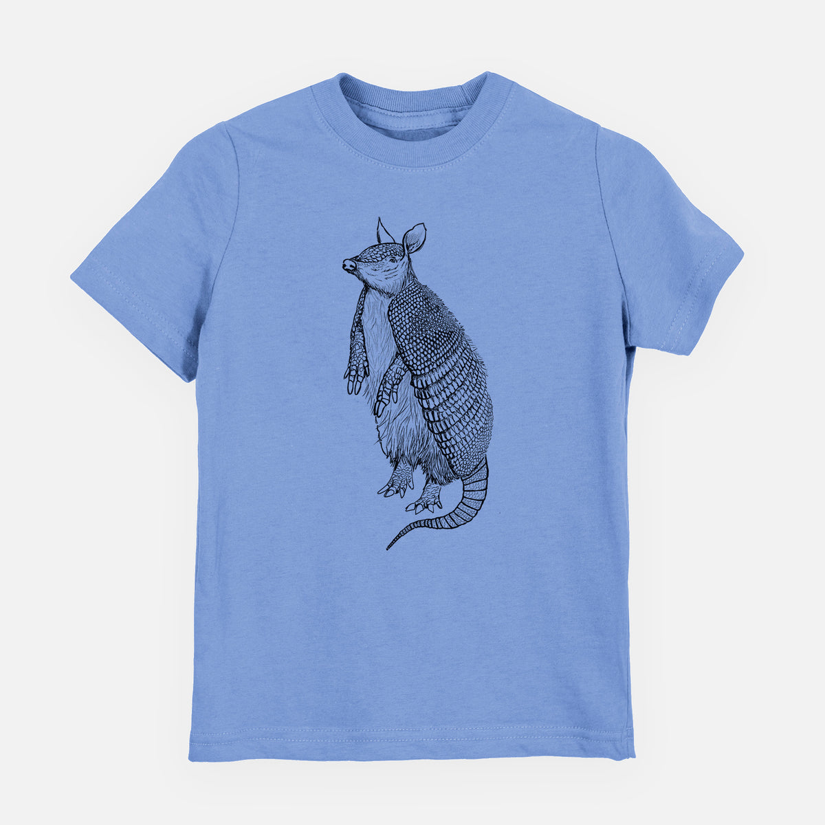 Carolina blue youth t-shirt laid flat, printed with a black ink illustration of a nine-banded armadillo standing upright.