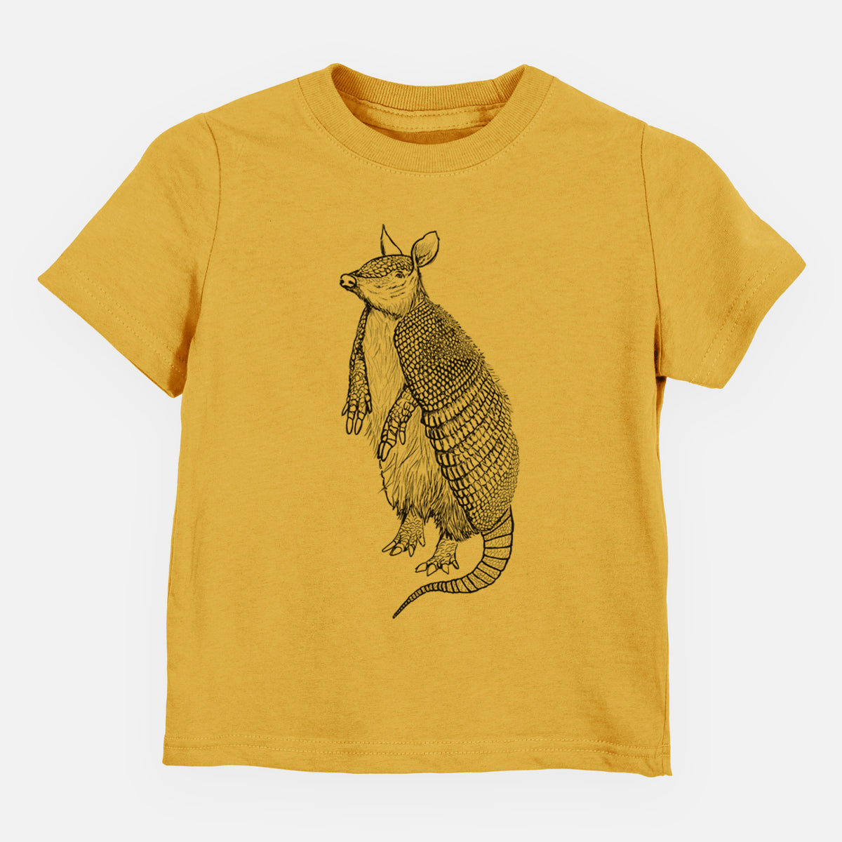 Honeycomb yellow toddler t-shirt laid flat, printed with a black ink illustration of a nine-banded armadillo standing upright.