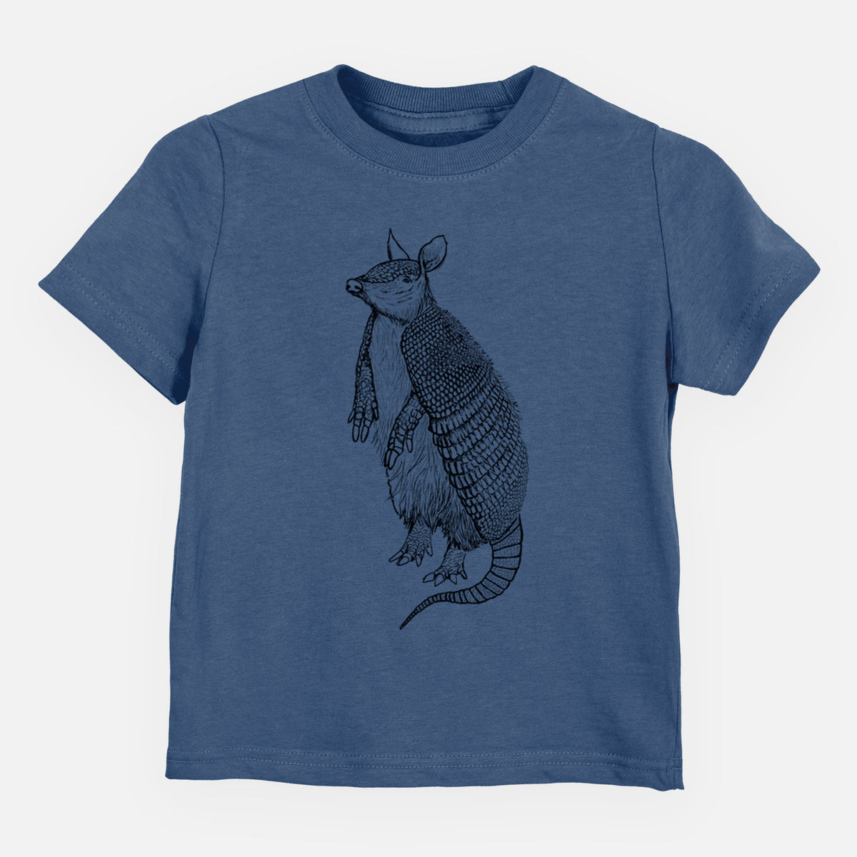 Indigo blue toddler t-shirt laid flat, printed with a black ink illustration of a nine-banded armadillo standing upright.