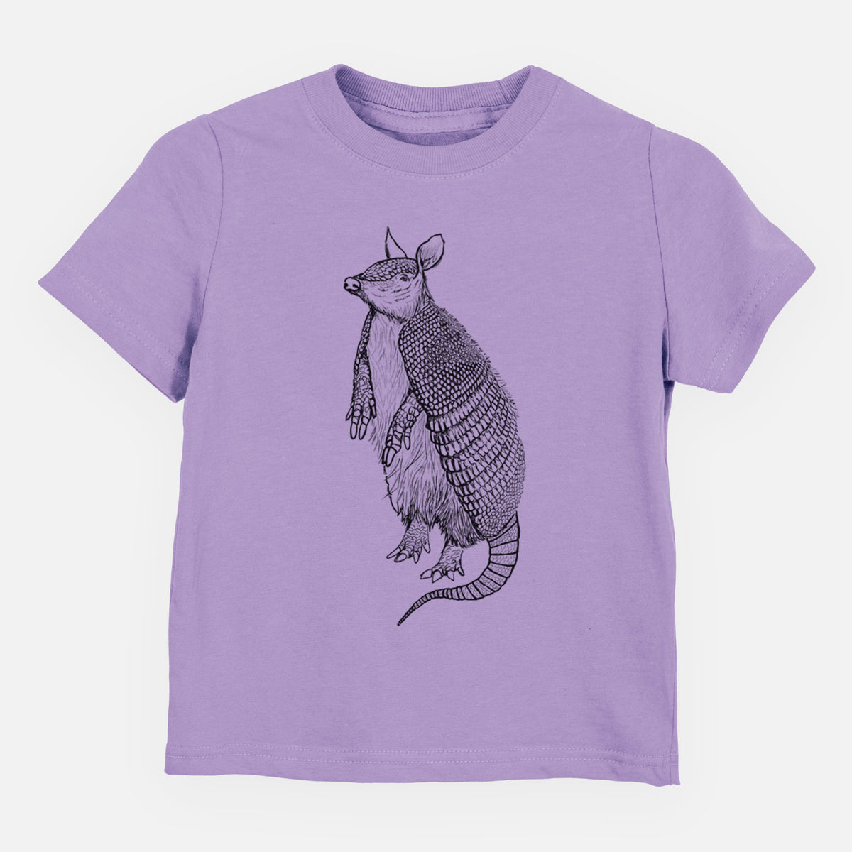 Lavender toddler t-shirt laid flat, printed with a black ink illustration of a nine-banded armadillo standing upright.