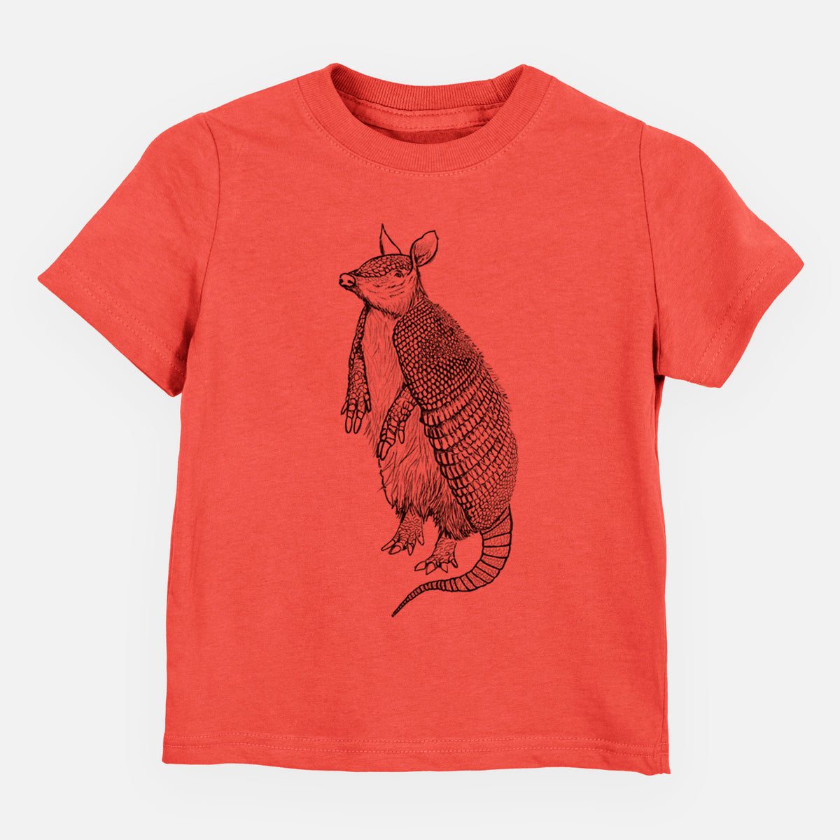 Passionfruit pink toddler t-shirt laid flat, printed with a black ink illustration of a nine-banded armadillo standing upright.