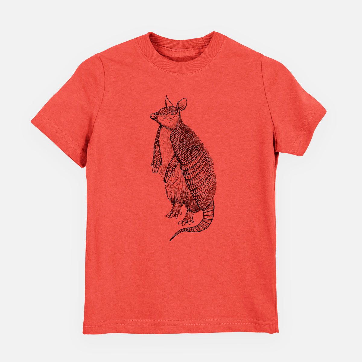 Passionfruit pink youth t-shirt laid flat, printed with a black ink illustration of a nine-banded armadillo standing upright.