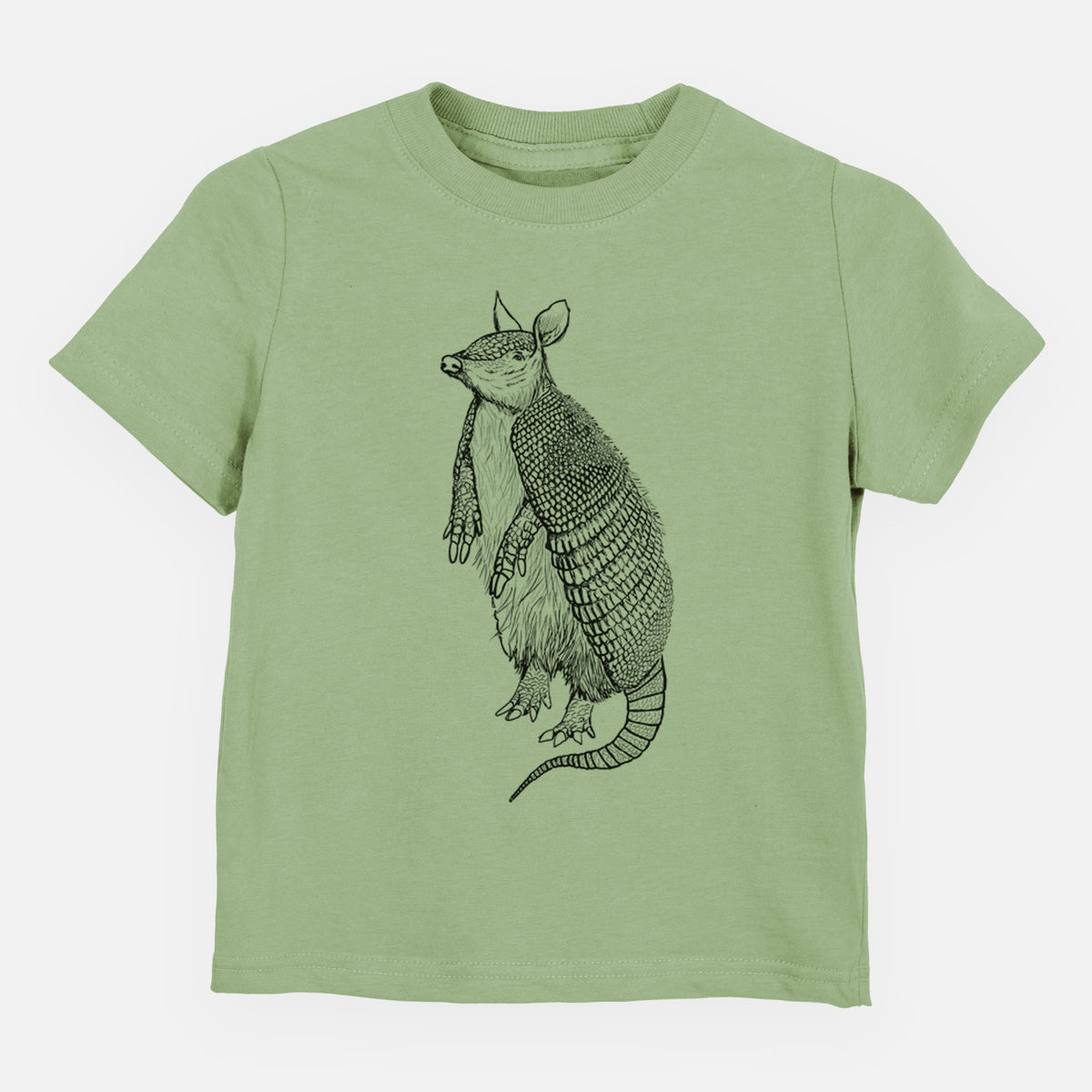 Sage green toddler t-shirt laid flat, printed with a black ink illustration of a nine-banded armadillo standing upright.