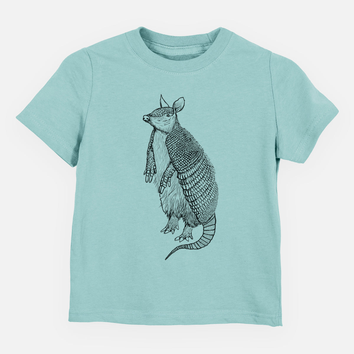 Saltwater toddler t-shirt laid flat, printed with a black ink illustration of a nine-banded armadillo standing upright.