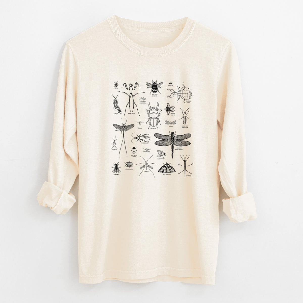 Ivory Comfort Colors long sleeve shirt laid flat with the cuffs rolled, printed with a chart of black ink insect and arthropod illustrations, including dragonflies, beetles, spiders and bees.