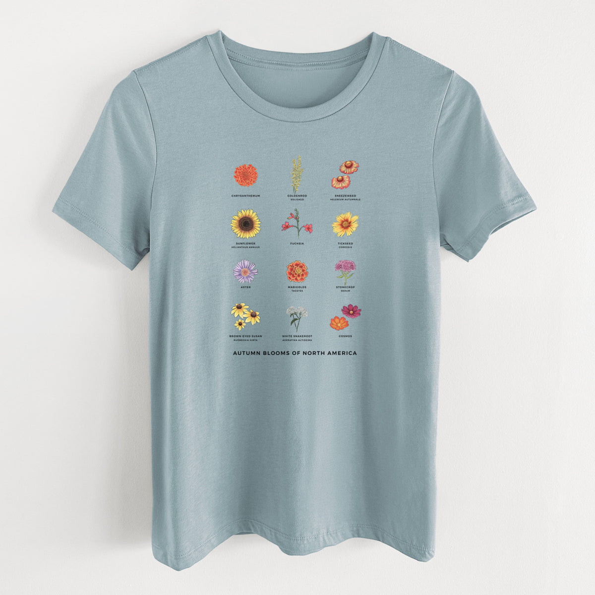 Vintage denim women's relaxed fit cotton t-shirt laid flat, printed with a full-color chart of autumn flowers, each labeled with its name.