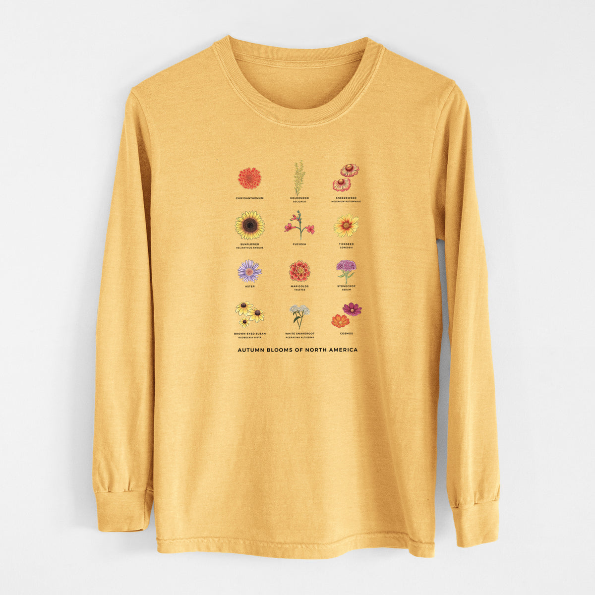 Golden wheat yellow Comfort Colors long sleeve shirt laid flat, printed with a full-color chart of autumn flowers, each labeled with its name.