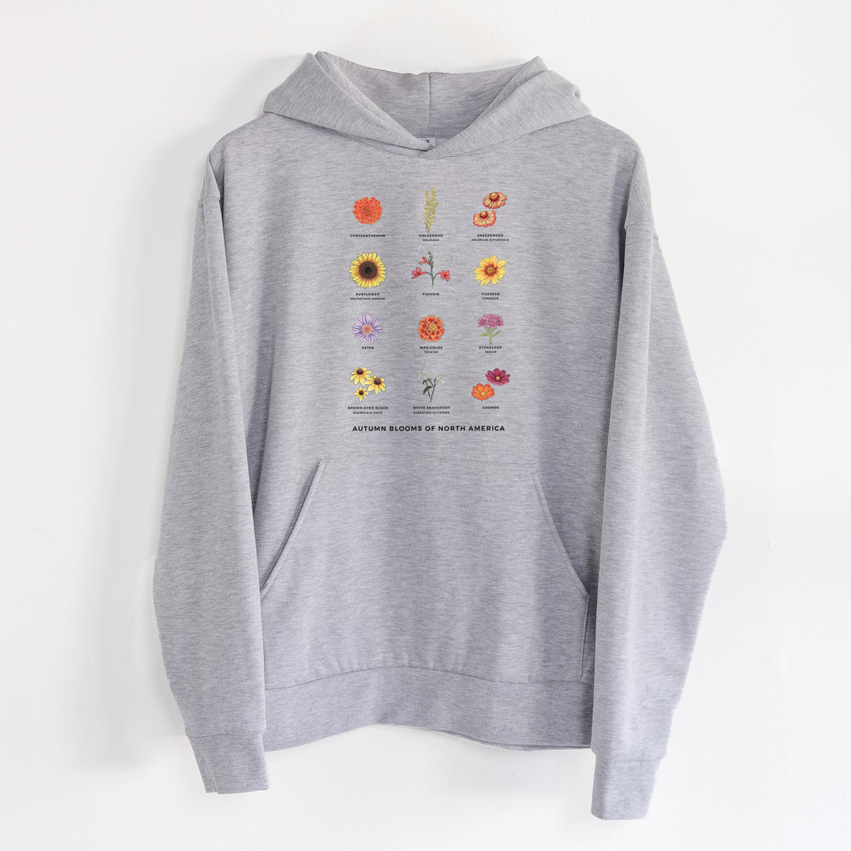 Autumn Blooms of North America - Statement Midweight Hoodie in Heather Grey, hanging on a white wall, with a front kangaroo pocket and no drawcords.
