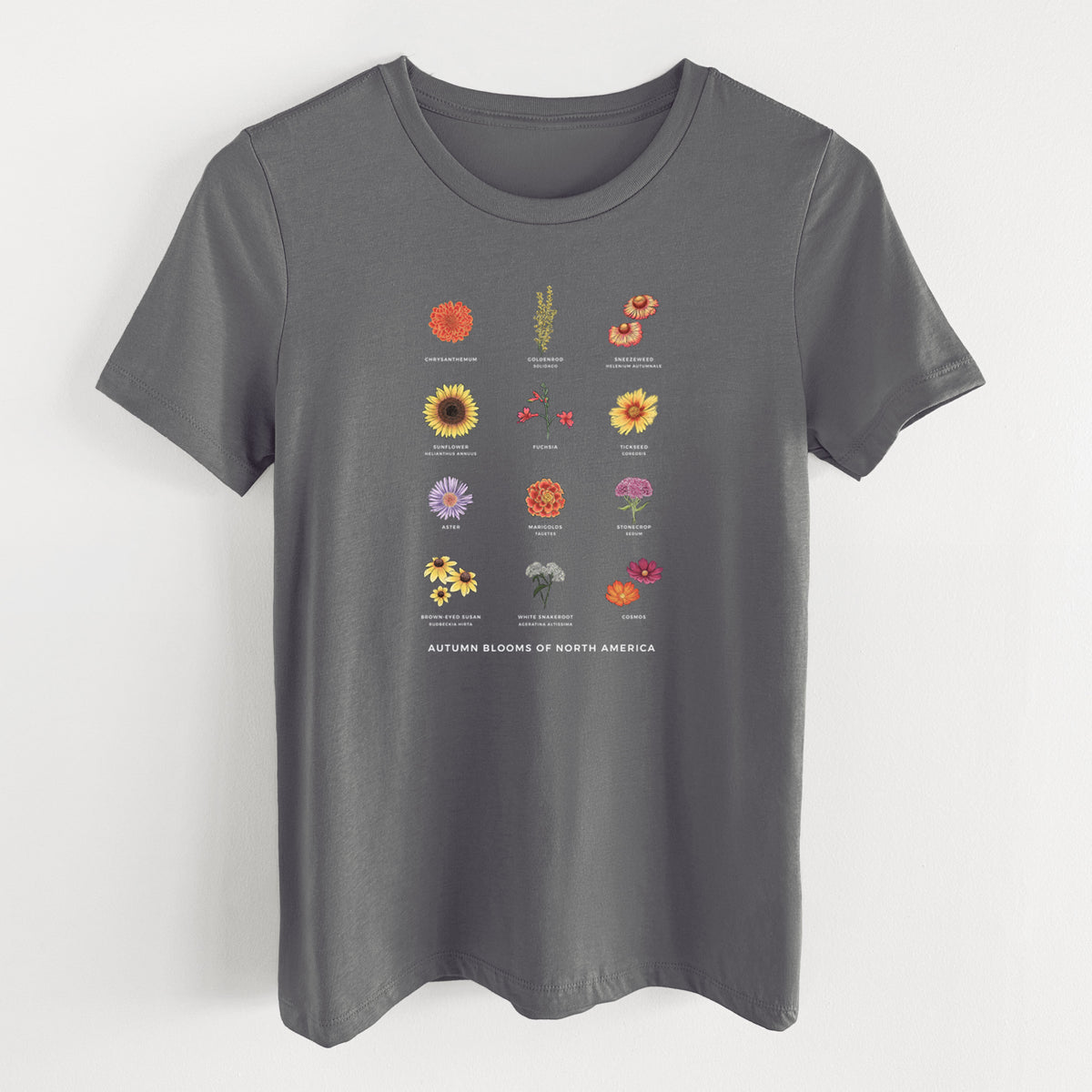 Asphalt women's relaxed fit cotton t-shirt laid flat, printed with a full-color chart of autumn flowers, each labeled with its name.