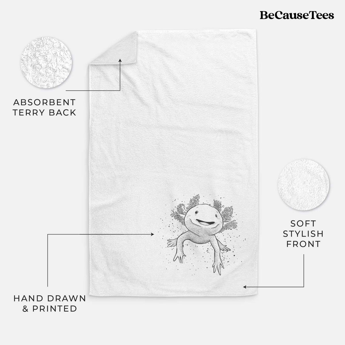 White hand towel printed with a black ink illustration of a smiling axolotl with feathery gills.