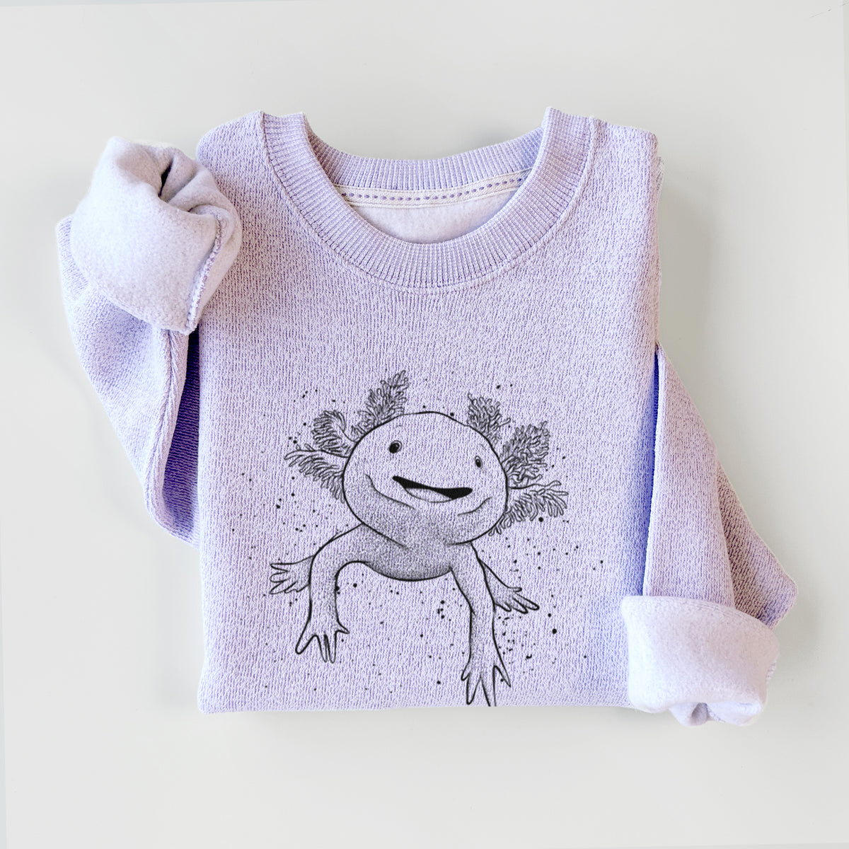 Ice purple knit sweatshirt printed with a black ink illustration of a smiling axolotl with feathery gills, styled flat.