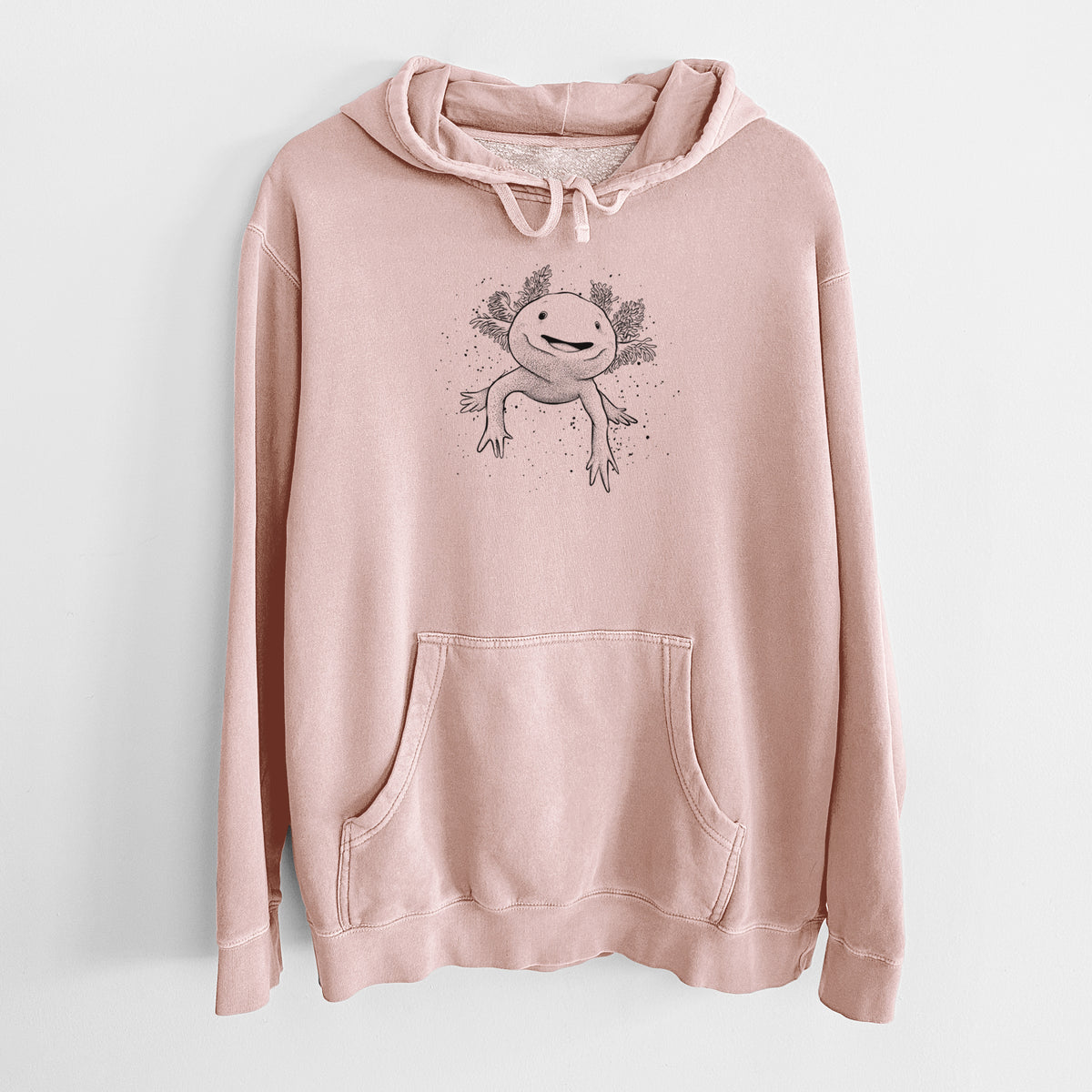 Dusty pink pigment dyed hoodie laid flat, printed with a black ink illustration of a smiling axolotl with feathery gills.
