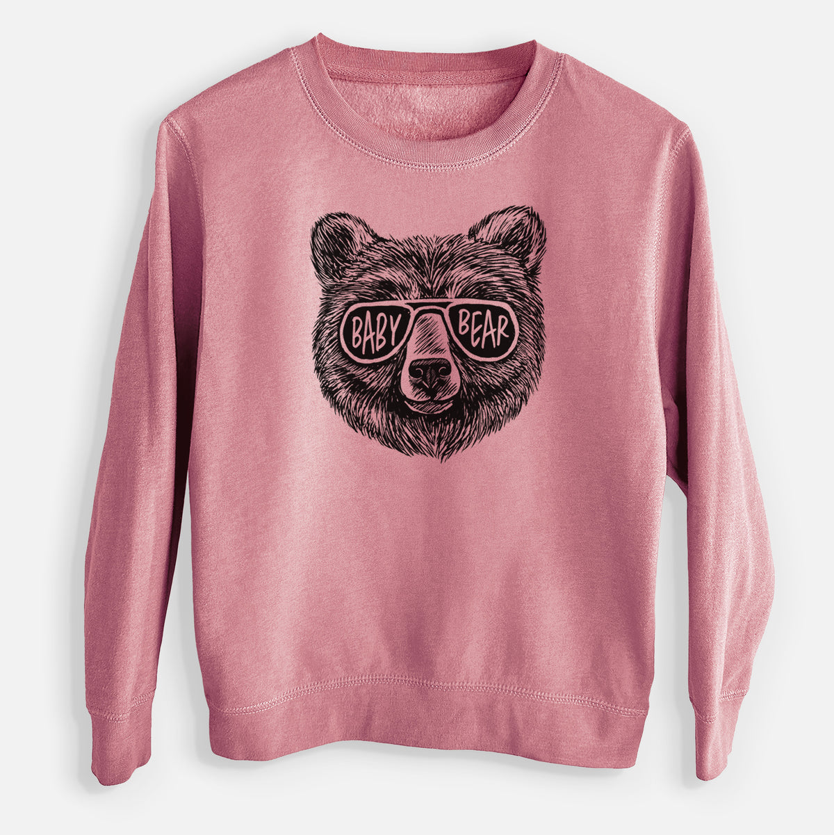 Mauve pink youth crewneck sweatshirt laid flat, printed with a black ink bear's face wearing sunglasses that read Baby Bear.