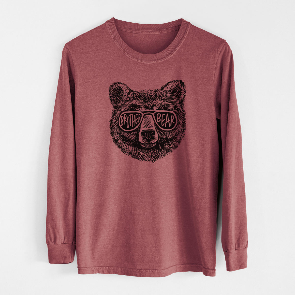 Brick red Comfort Colors long sleeve shirt laid flat, printed with a black ink bear's face wearing sunglasses that read Brother Bear.