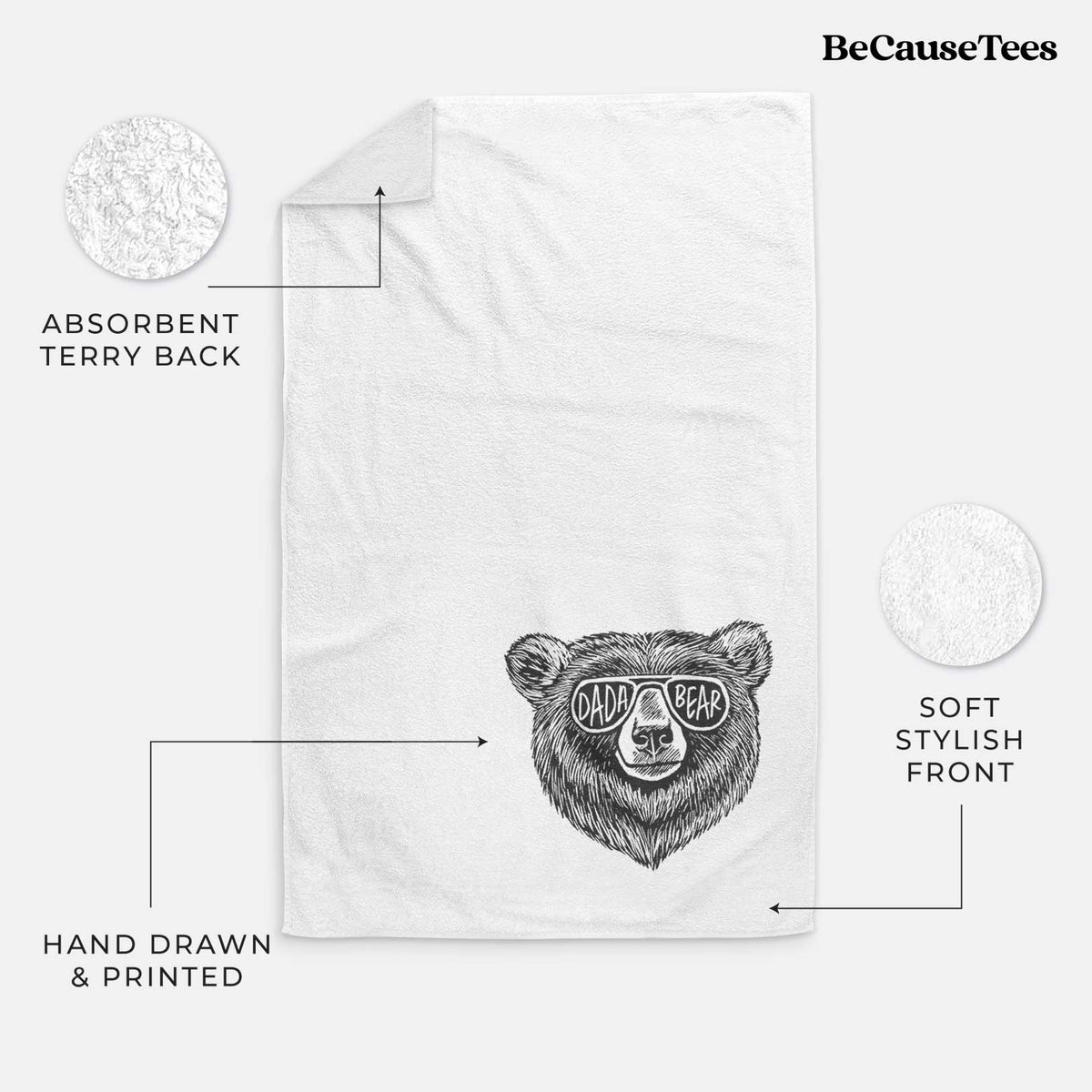 White hand towel printed with a black ink bear's face wearing sunglasses that read Dada Bear.