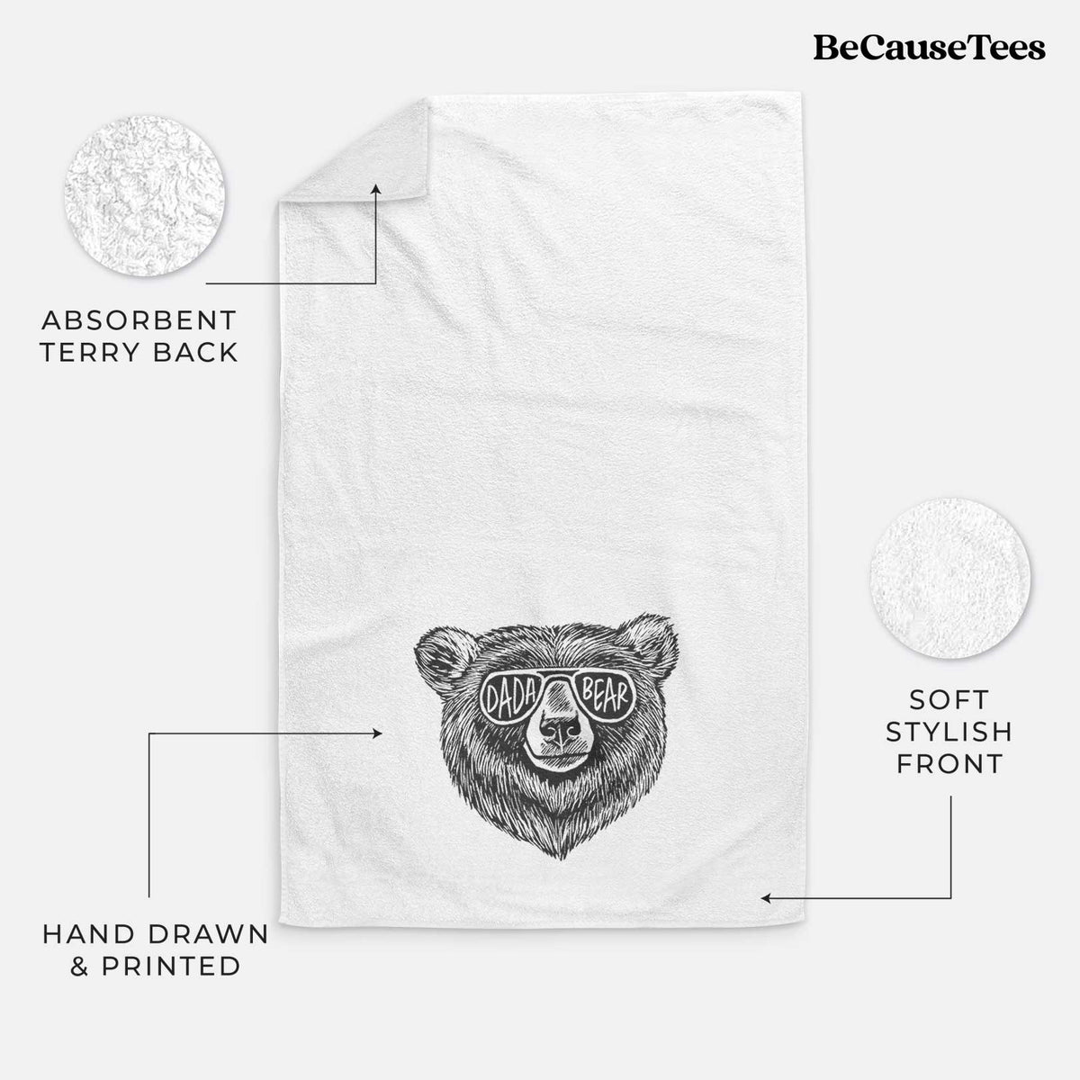 White hand towel printed with a black ink bear's face wearing sunglasses that read Dada Bear.