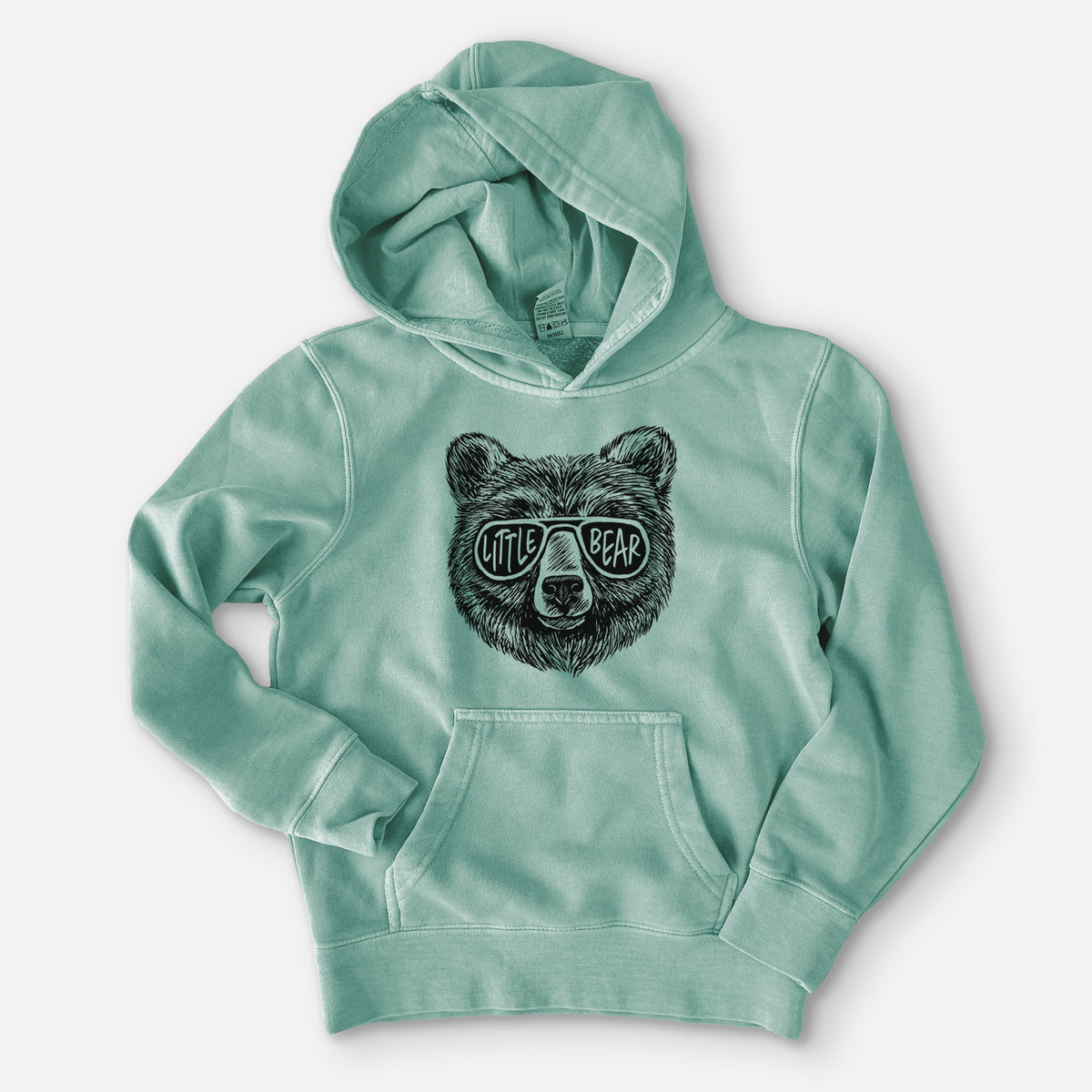 Sea green youth pigment dyed hoodie laid flat, printed with a black ink bear's face wearing sunglasses that read Little Bear.