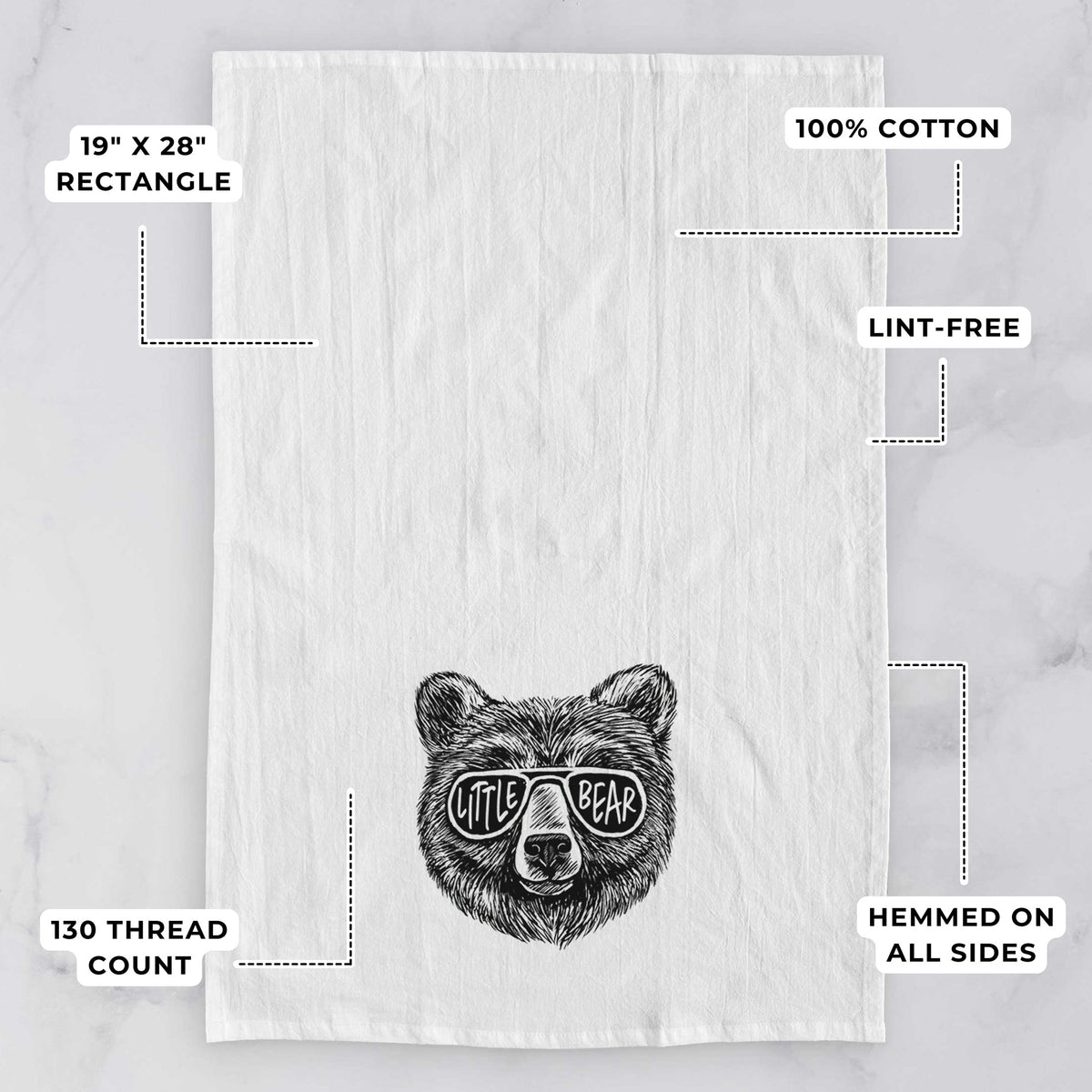 White tea towel printed with a black ink bear's face wearing sunglasses that read Little Bear, with feature labels: 19 by 28 inch rectangle, 100% cotton, lint-free, 130 thread count, hemmed on all sides.