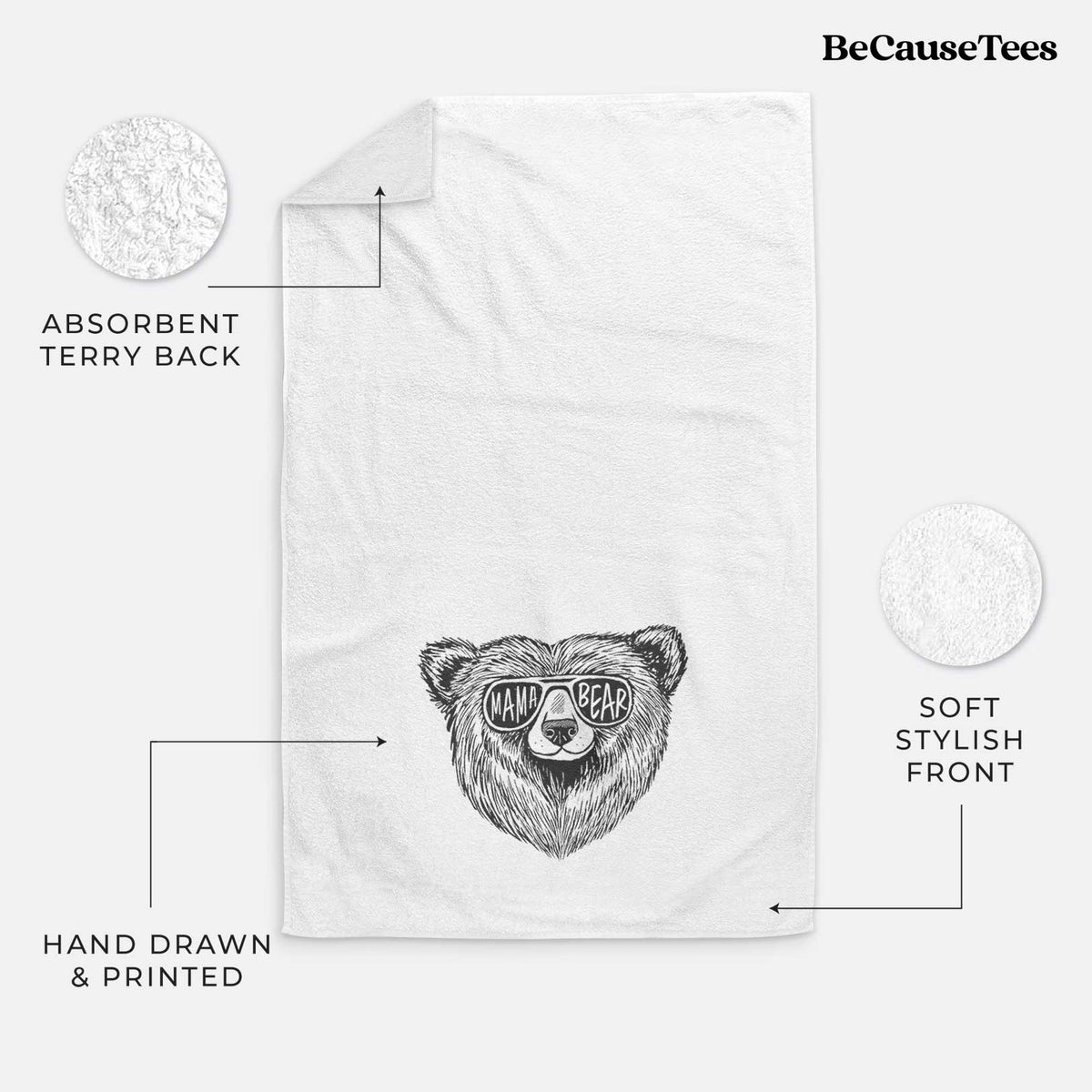 White hand towel printed with a black ink bear's face wearing sunglasses that read Mama Bear.