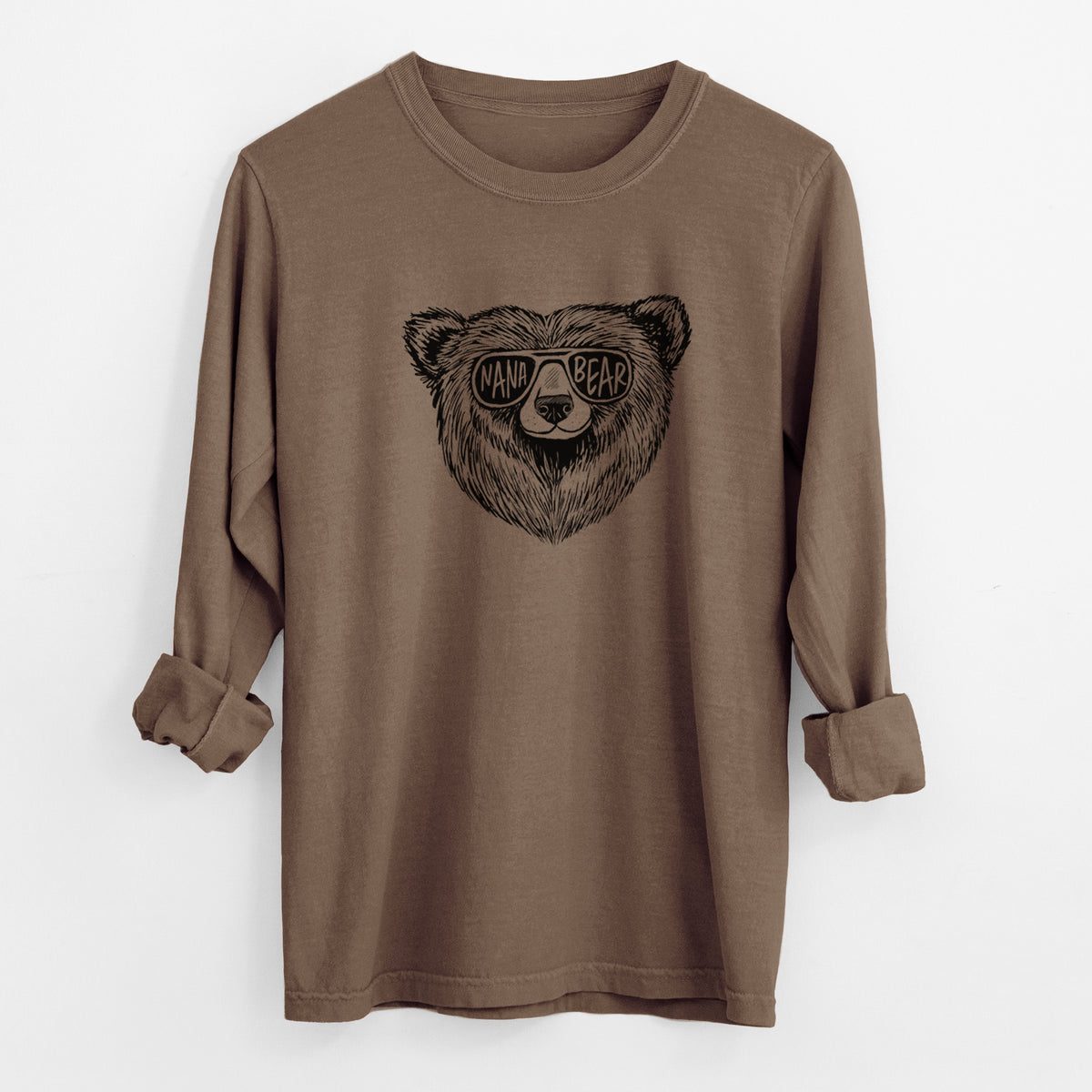 Espresso brown Comfort Colors long sleeve shirt laid flat with the cuffs rolled, printed with a black ink bear's face wearing sunglasses that read Nana Bear.