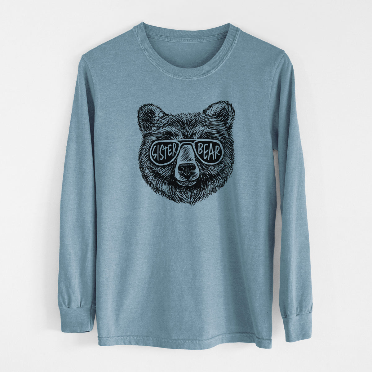 Steel blue Comfort Colors long sleeve shirt laid flat, printed with a black ink bear's face wearing sunglasses that read Sister Bear.