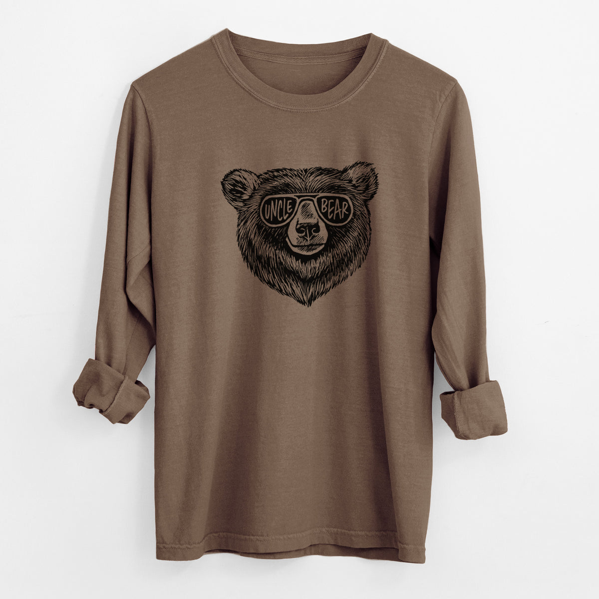 Espresso brown Comfort Colors long sleeve shirt laid flat with the cuffs rolled, printed with a black ink bear's face wearing sunglasses that read Uncle Bear.