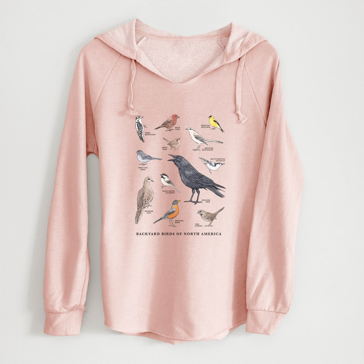 Blush pink women's Cali Wave hooded sweatshirt laid flat, printed with a full-color chart of North American backyard birds, each labeled with its species.
